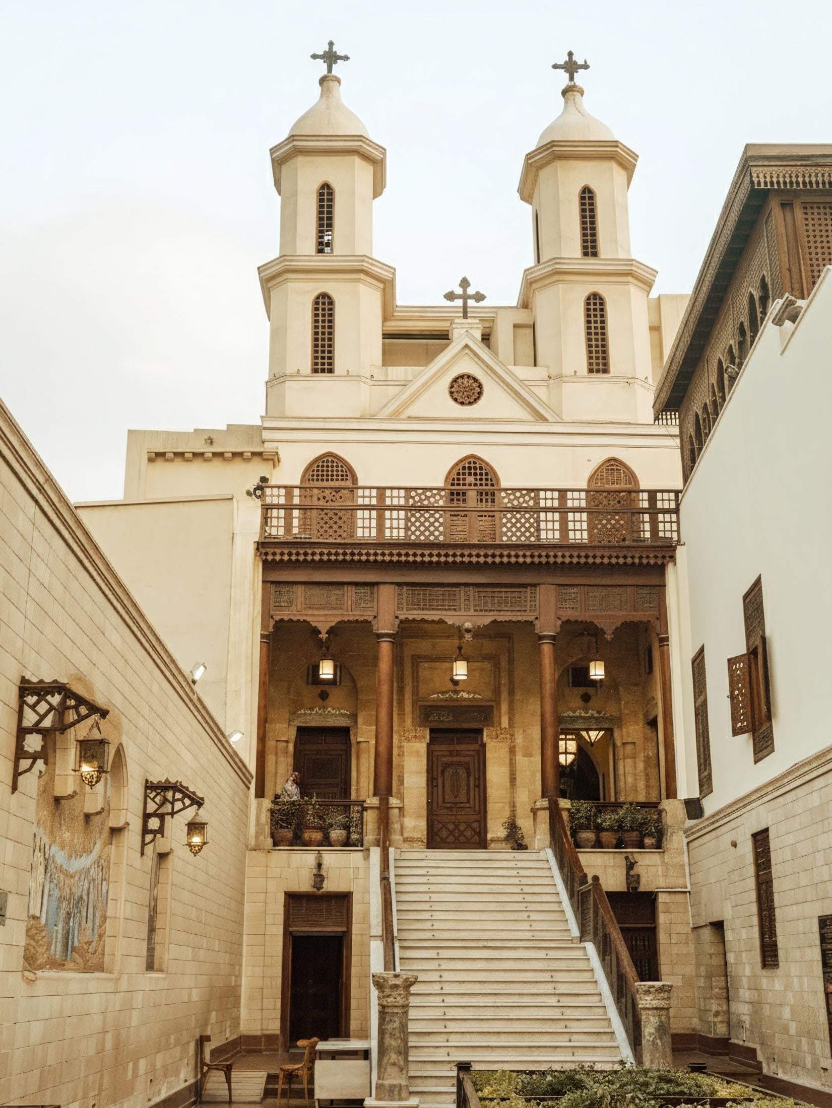 Exterior of the Hanging Church (Saint Virgin Mary) in Coptic Cairo with twin bell towers