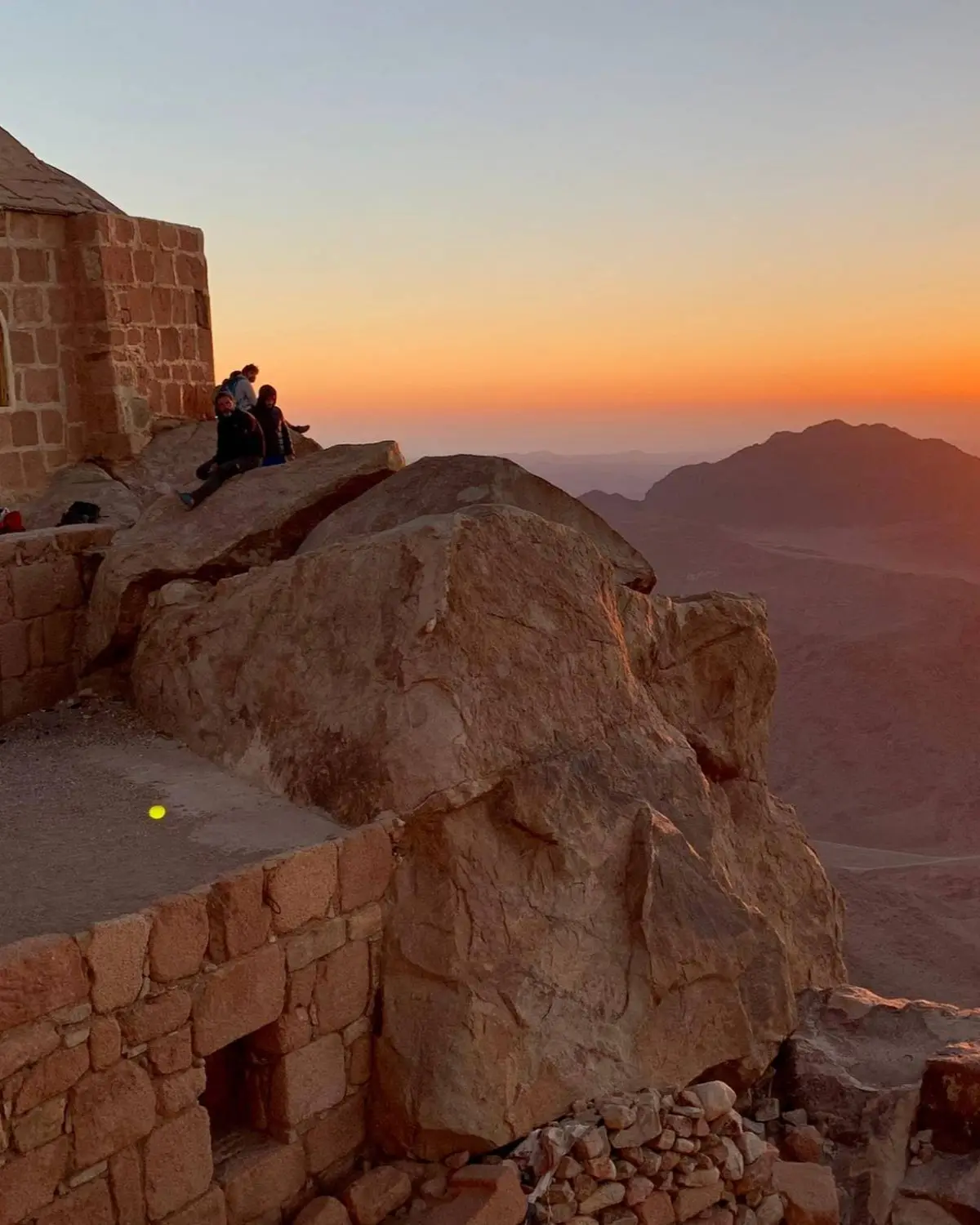 Sunrise over the surrounding peaks at Mount Sinai (Jabal Musa)