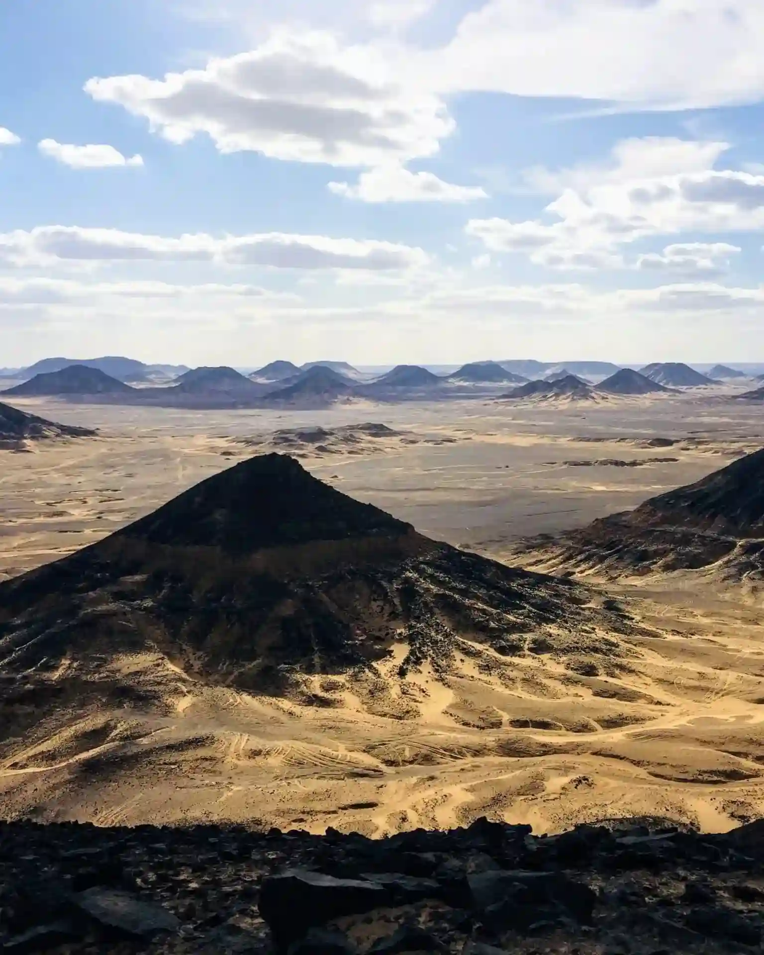 Dark volcanic mounds of the Black Desert