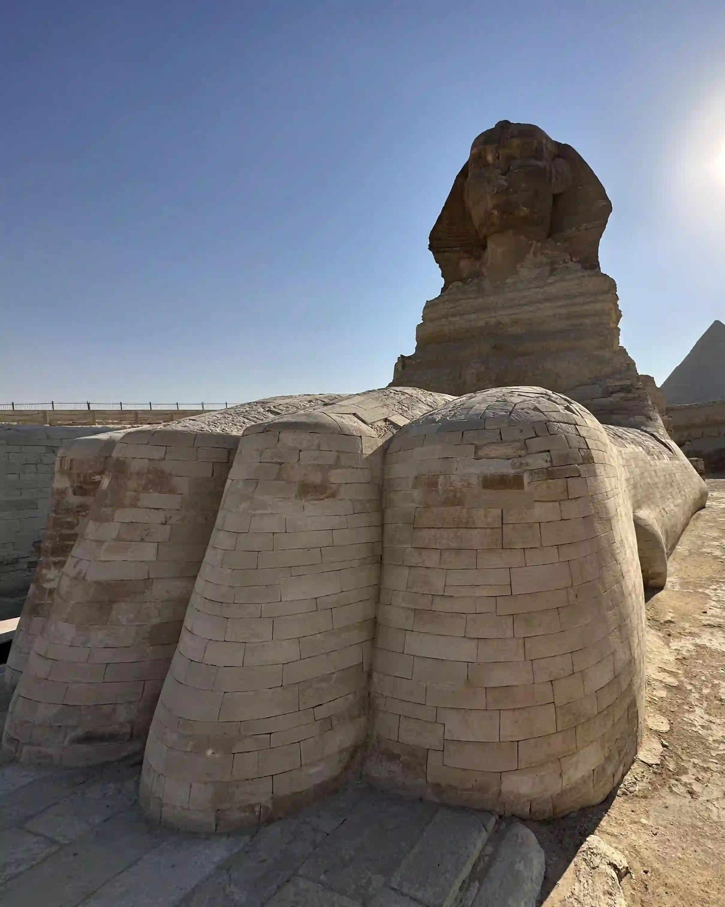 Highlight of the massive, block-constructed front paws of the Great Sphinx of Giza