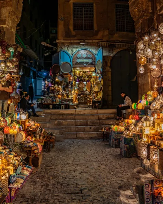 A historic cobblestone alleyway in Khan el-Khalili bazaar