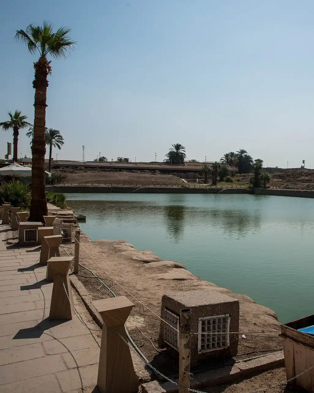 Green waters of the ancient Sacred Lake at Karnak Temple