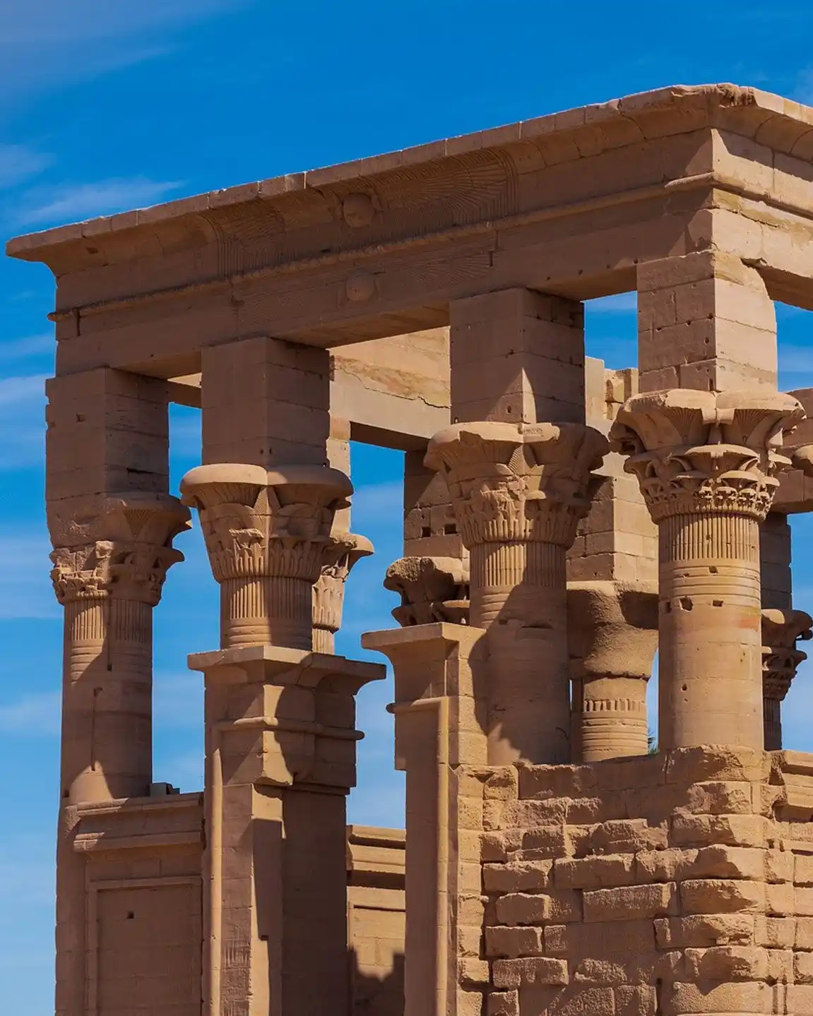 The ancient stone pillars and decorated capitals of Trajan's Kiosk at Philae Temple