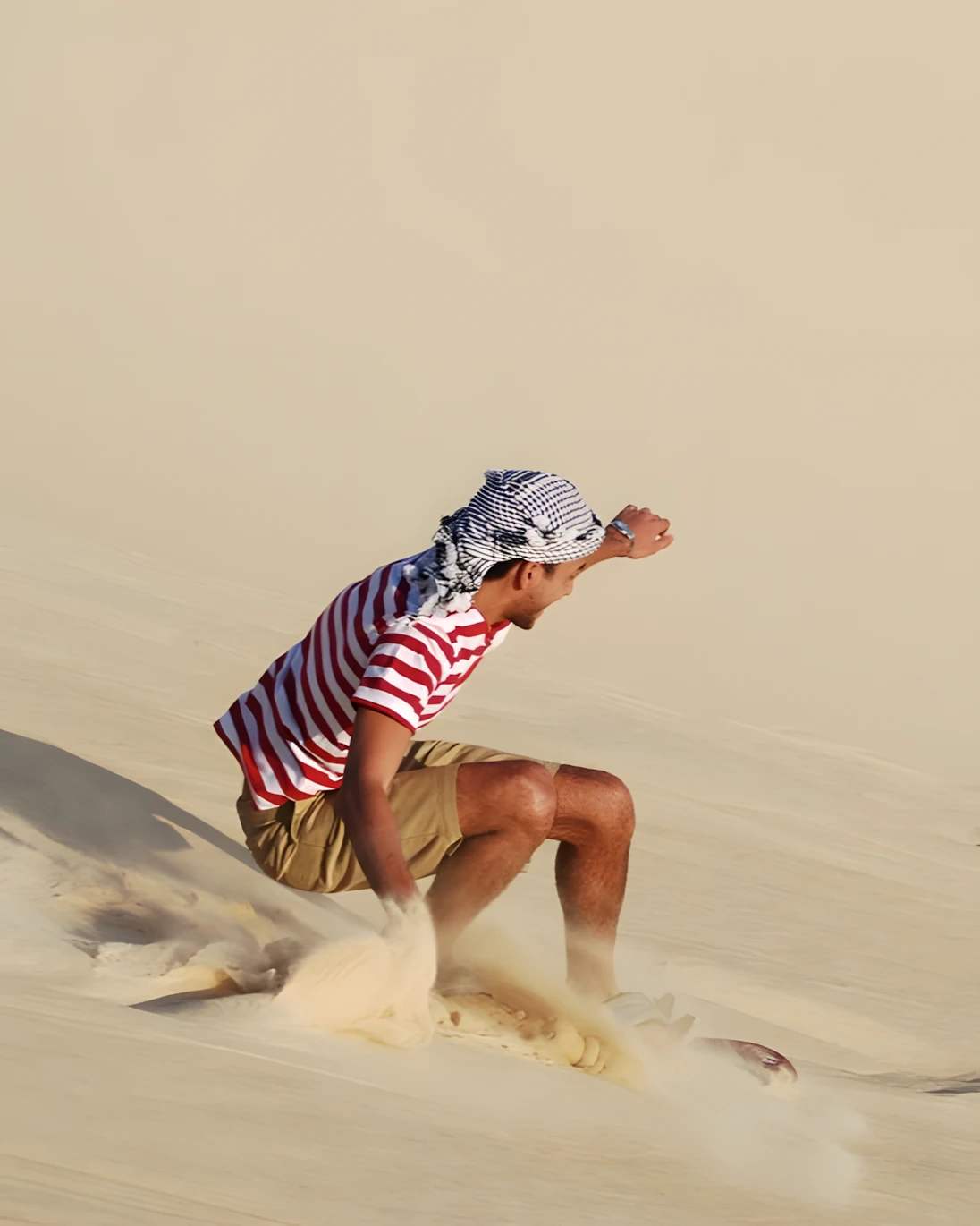 Sandboarding on the golden dunes near fossil area