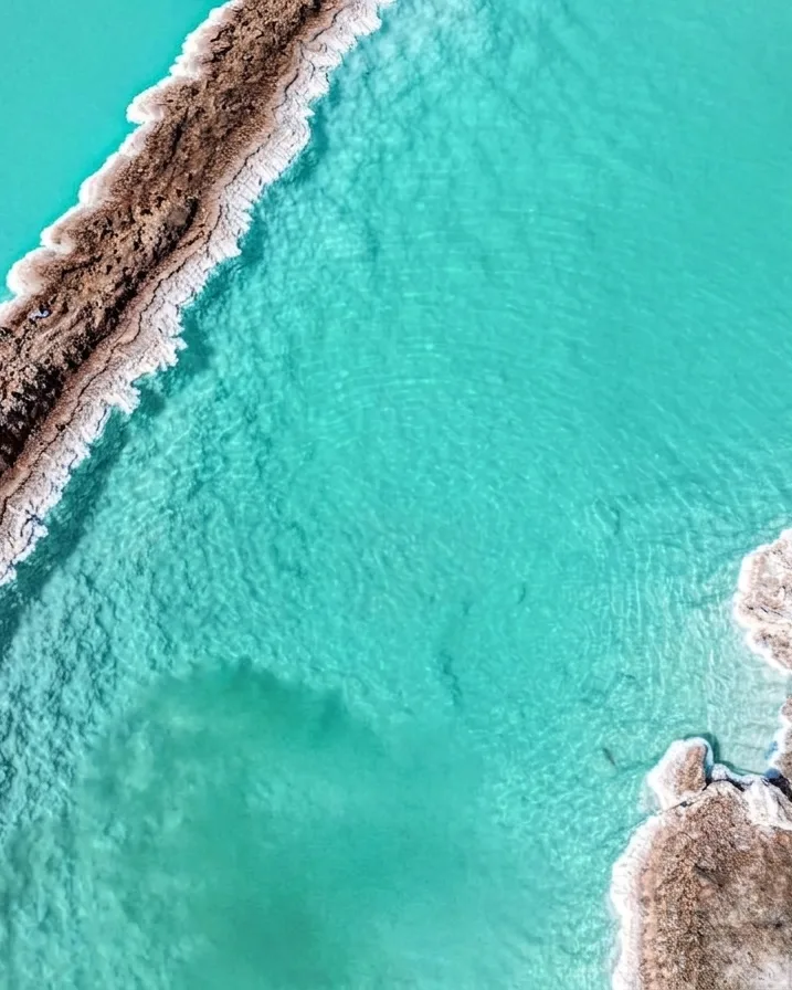 Vibrant turquoise salt lake of Siwa